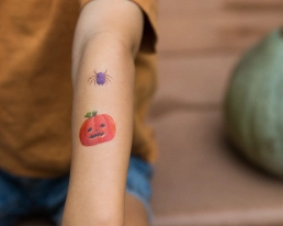 Child pumpkin tattoo