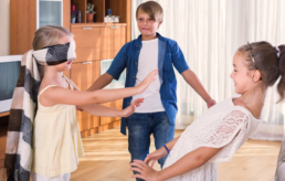 children playing blindfolded tag