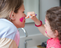 child who put make-up on his mother