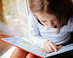 children reading a book